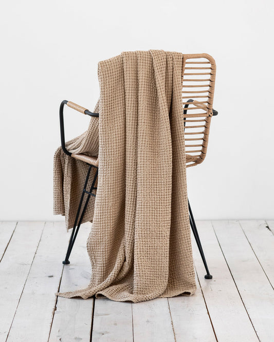 https://cdn.shopify.com/s/files/1/0640/8454/1699/files/beige-waffle-throw.jpg?v=1729150673
