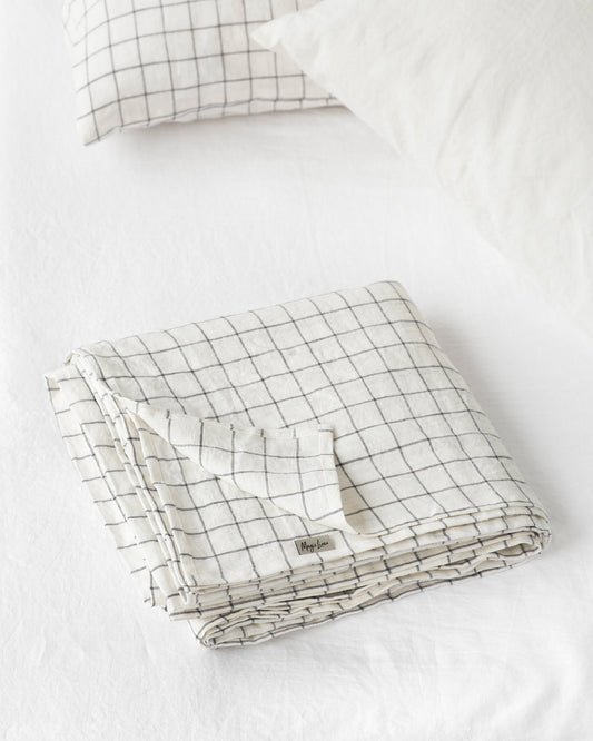 https://cdn.shopify.com/s/files/1/0640/8454/1699/products/charcoal-grid-linen-flat-sheet-1.jpg?v=1754487491