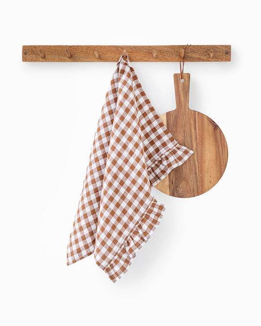 https://cdn.shopify.com/s/files/1/0640/8454/1699/files/cinnamon-gingham-ruffle-tea-towel-1_42a55279-317b-45d9-8d28-0fc5a57883f8.jpg?v=1705578652