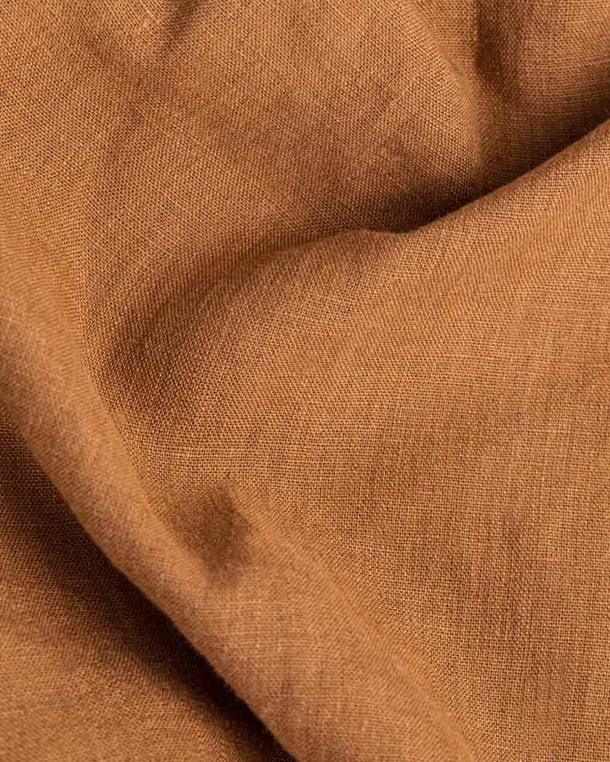 https://cdn.shopify.com/s/files/1/0640/8454/1699/products/cinnamon-linen-fitted-sheet-2.jpg?v=1697008658