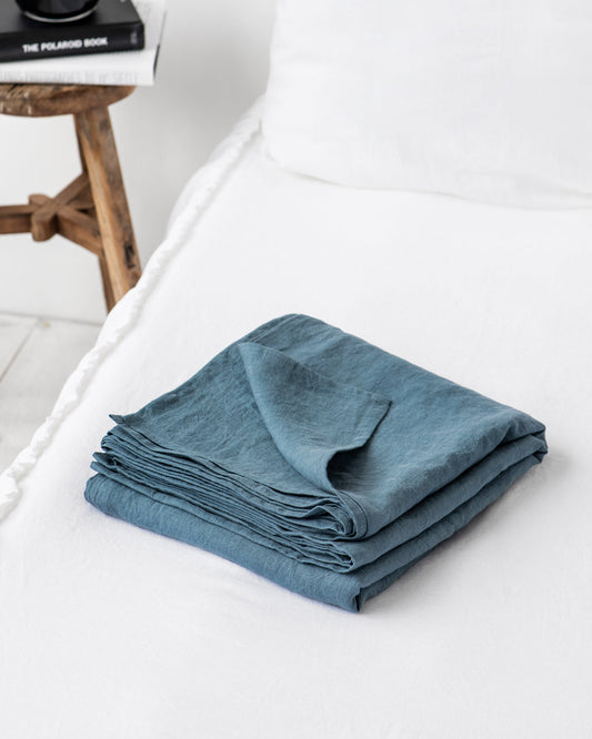 https://cdn.shopify.com/s/files/1/0640/8454/1699/products/gray-blue-linen-flat-sheet-1.jpg?v=1660216148