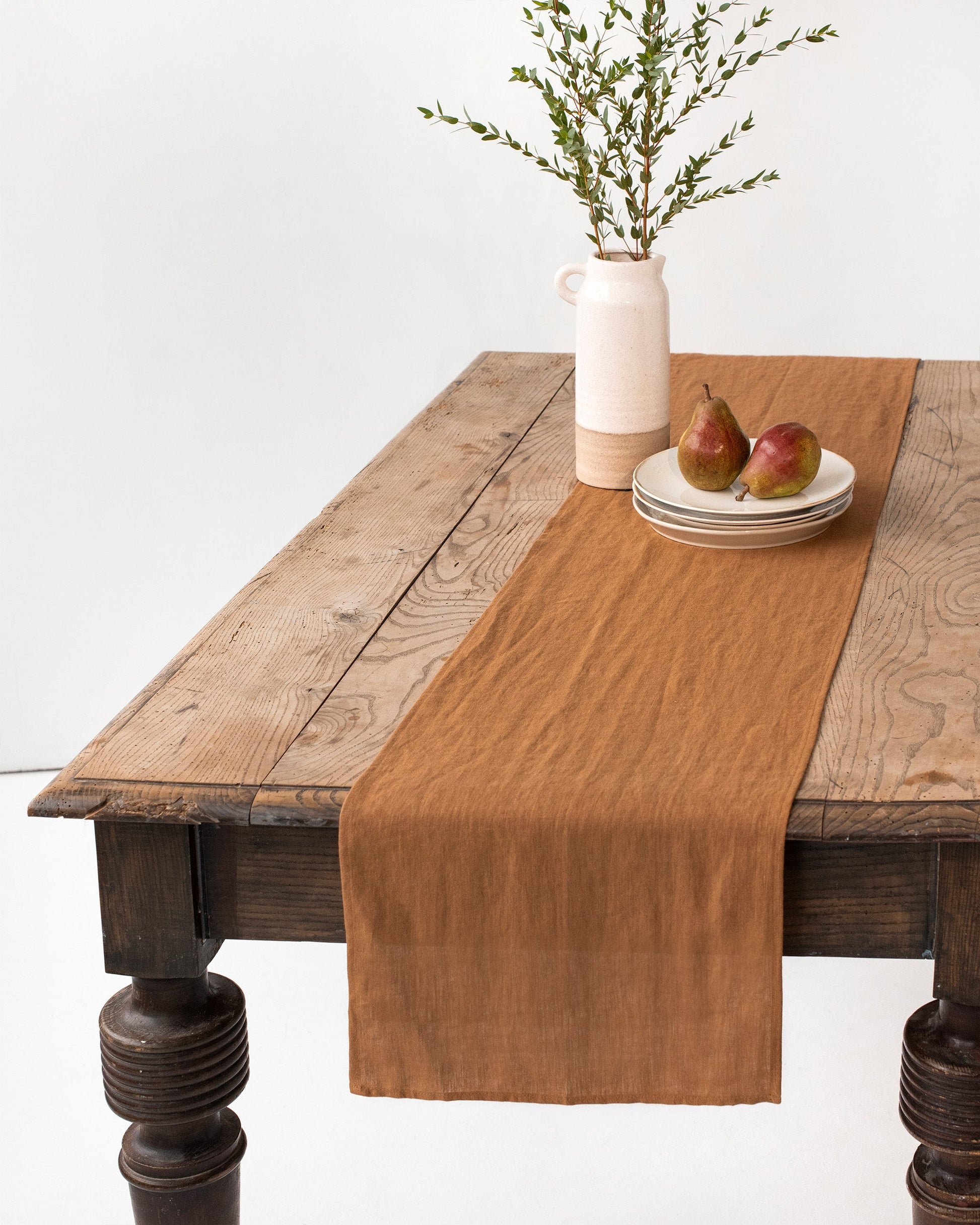 https://cdn.shopify.com/s/files/1/0640/8454/1699/products/linen-table-runner-cinnamon.jpg?v=1674739088
