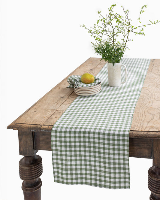 https://cdn.shopify.com/s/files/1/0640/8454/1699/files/linen-table-runner-forest-green-gingham-1.jpg?v=1712568660