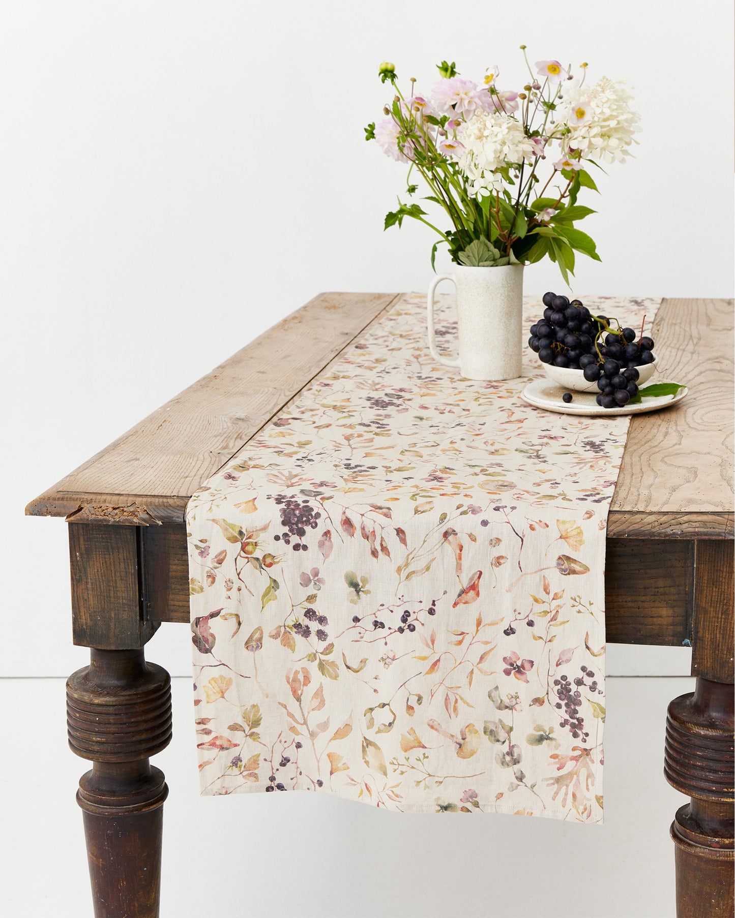 https://cdn.shopify.com/s/files/1/0640/8454/1699/files/linen-table-runner-in-autumn-forest-print-3.jpg?v=1756994114