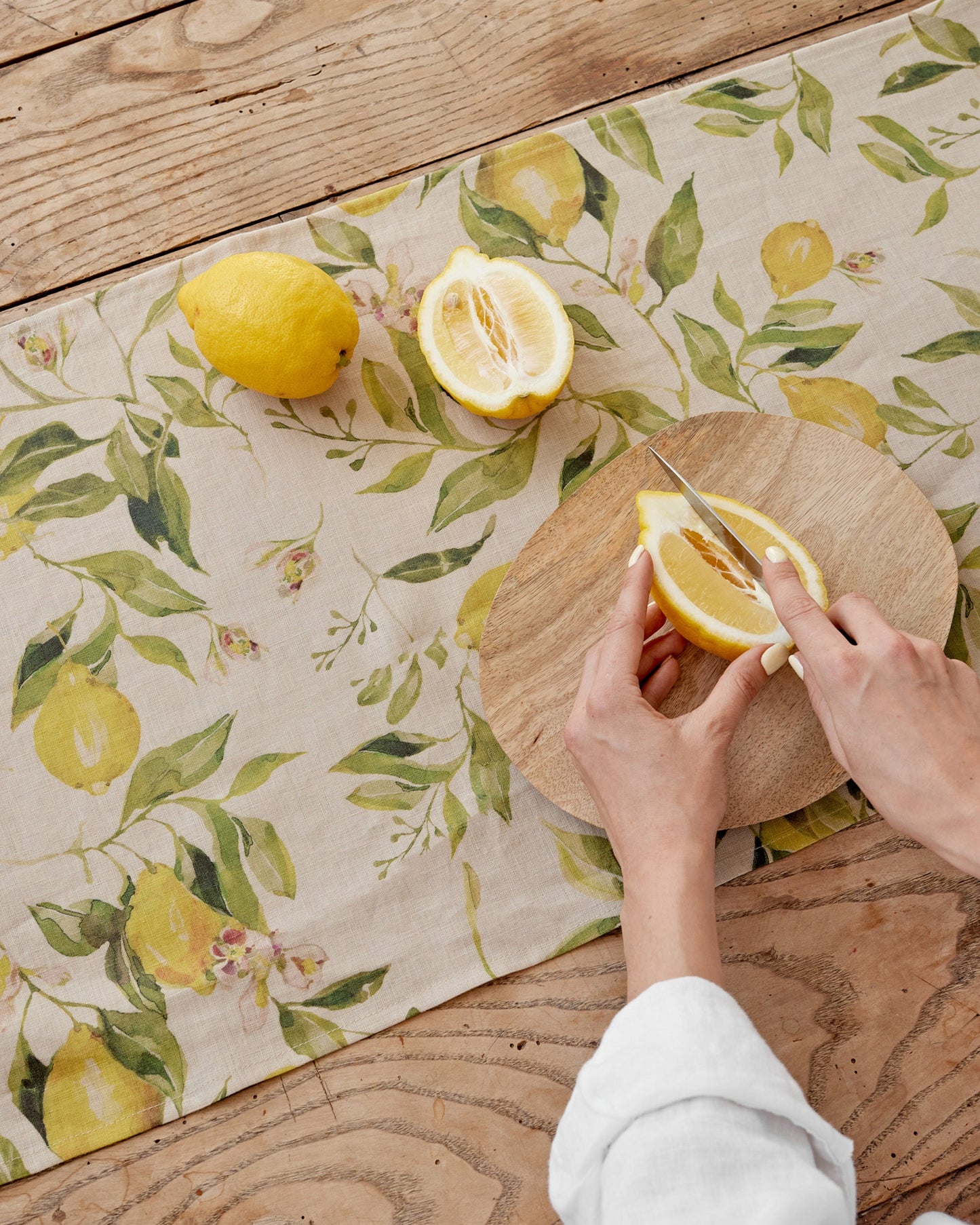 https://cdn.shopify.com/s/files/1/0640/8454/1699/files/linen-table-runner-in-citrus-garden-print-on-natural-2.jpg?v=1749545404