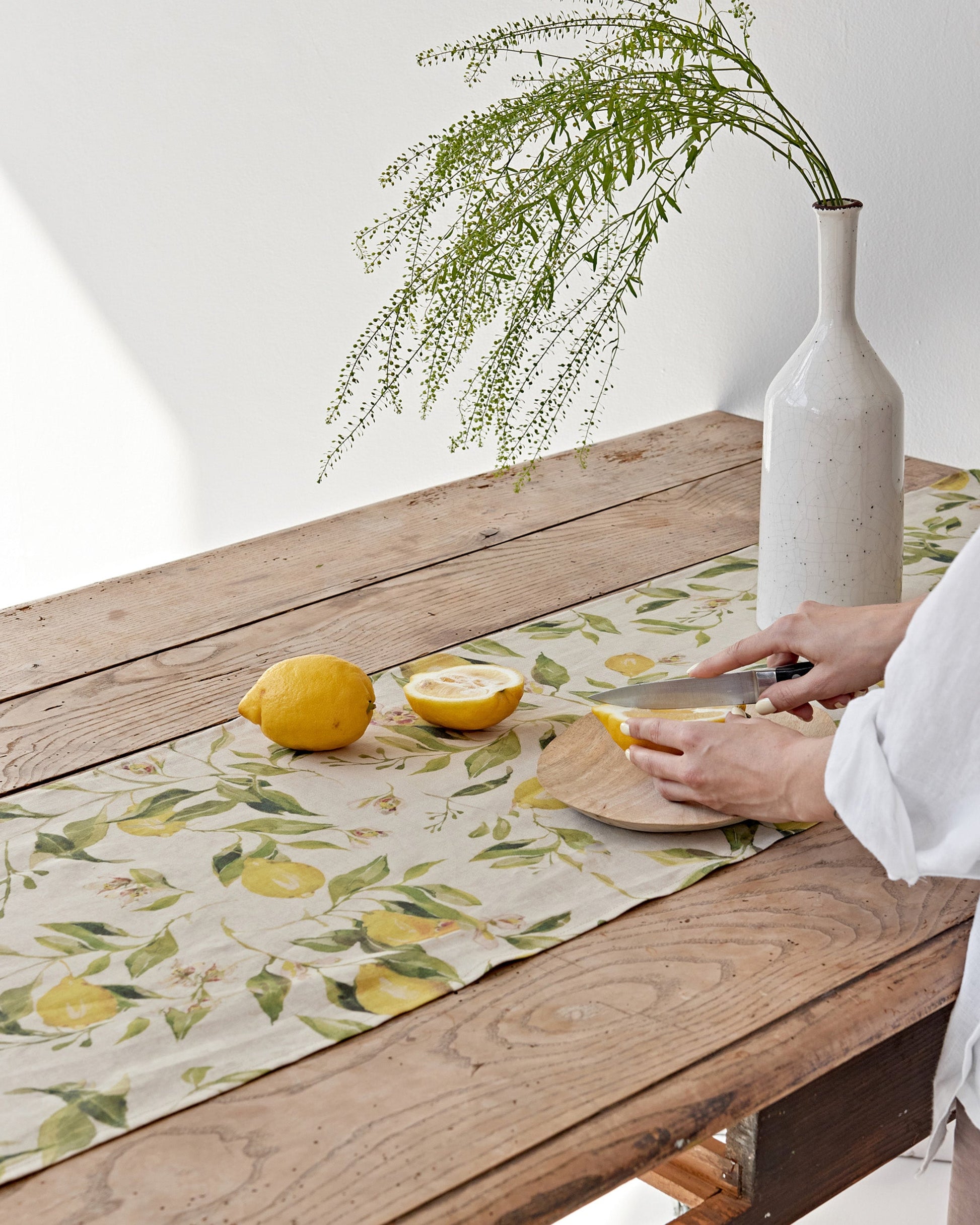 https://cdn.shopify.com/s/files/1/0640/8454/1699/files/linen-table-runner-in-citrus-garden-print-on-natural-3.jpg?v=1749545403