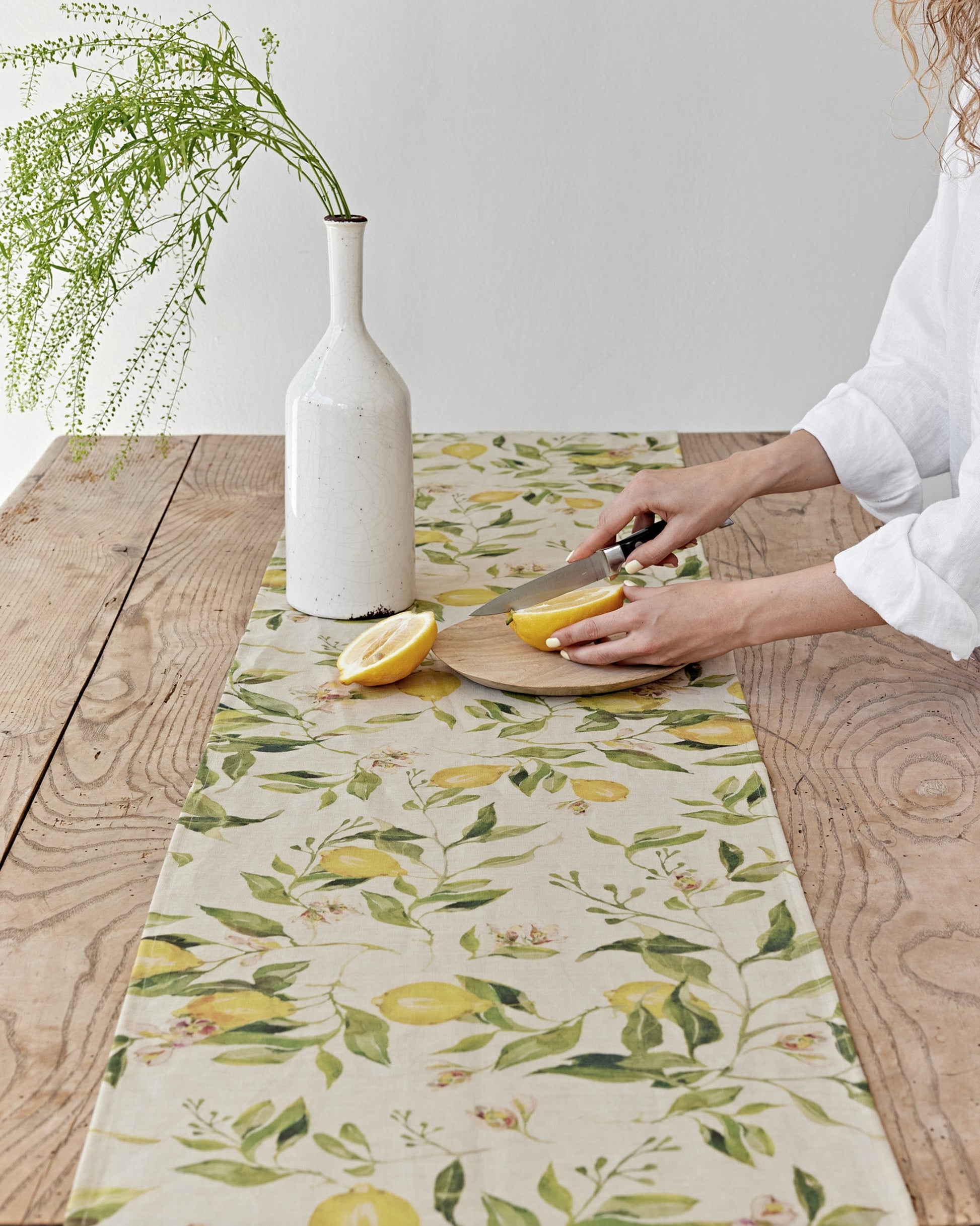 https://cdn.shopify.com/s/files/1/0640/8454/1699/files/linen-table-runner-in-citrus-garden-print-on-natural-4.jpg?v=1749545403