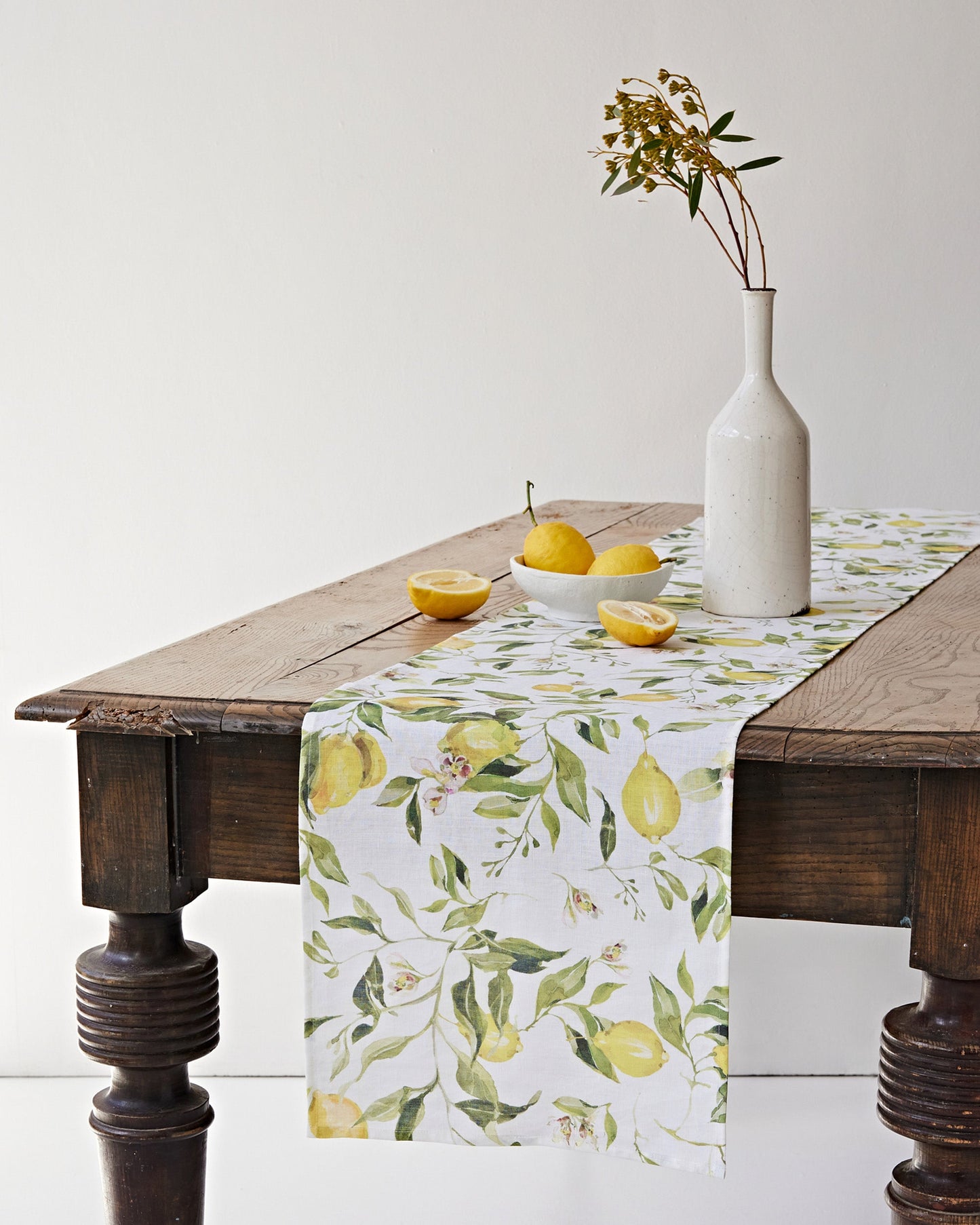 https://cdn.shopify.com/s/files/1/0640/8454/1699/files/linen-table-runner-in-citrus-garden-print-on-white-3.jpg?v=1749545405