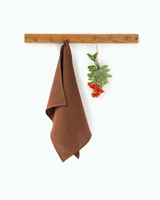 https://cdn.shopify.com/s/files/1/0640/8454/1699/files/linen-tea-towel-in-chocolate-brown.jpg?v=1745909199