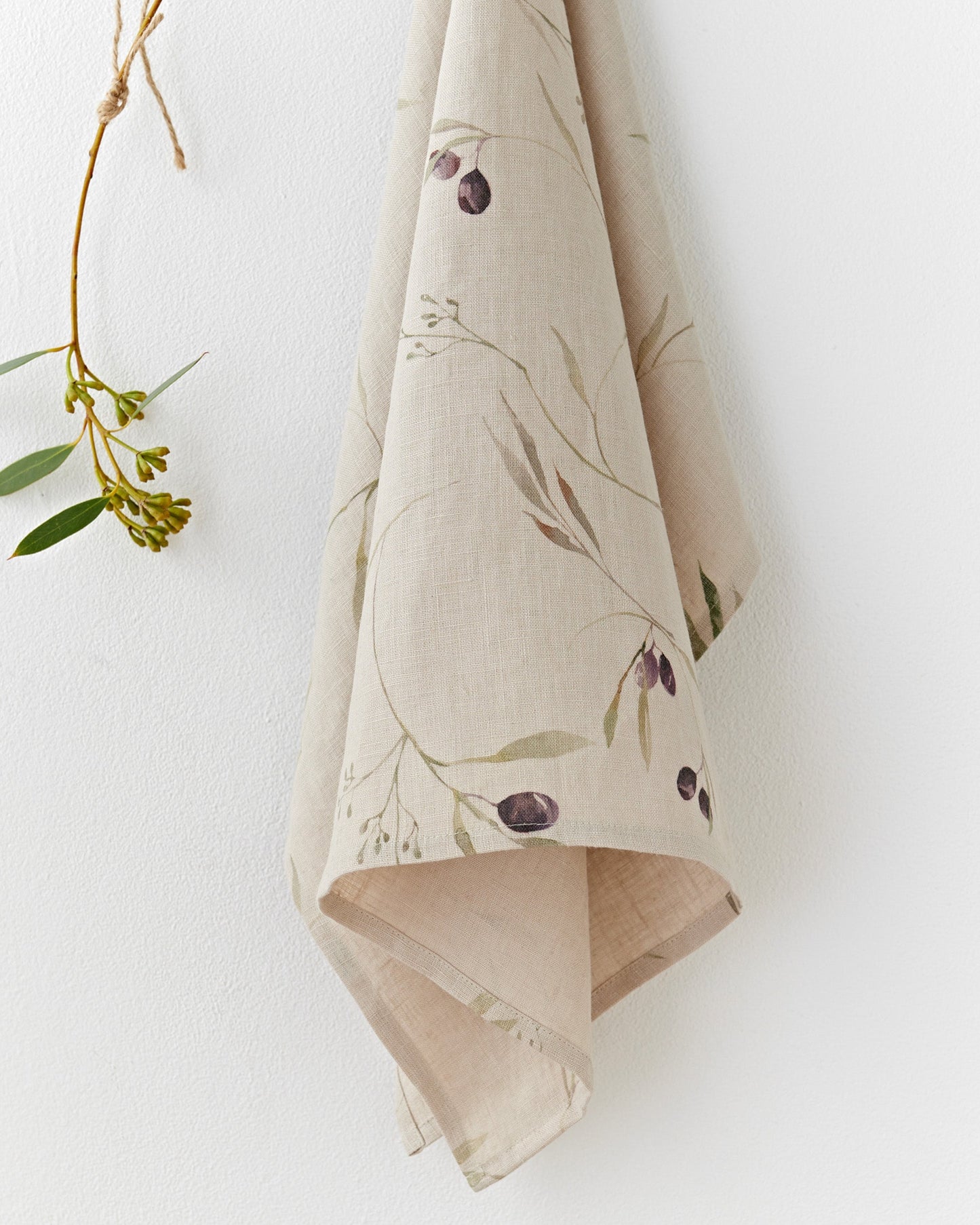 https://cdn.shopify.com/s/files/1/0640/8454/1699/files/linen-tea-towel-in-olive-orchard-print-on-natural-1.jpg?v=1749545424