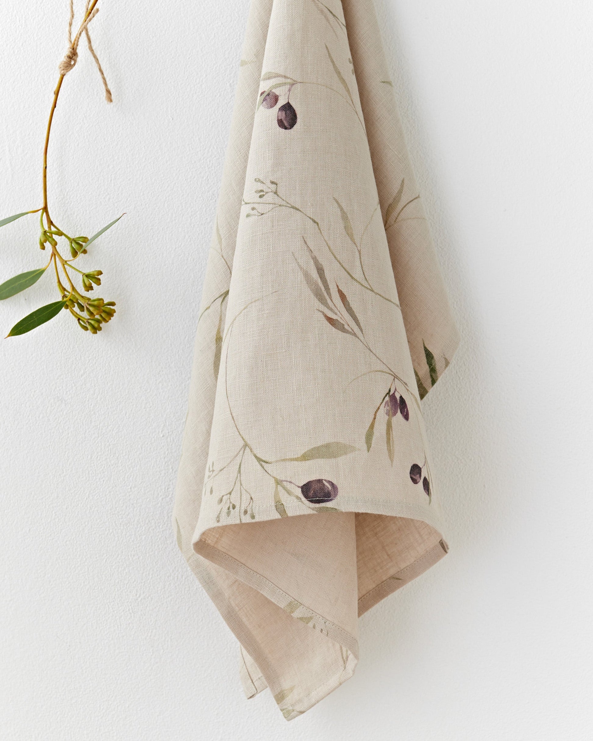 https://cdn.shopify.com/s/files/1/0640/8454/1699/files/linen-tea-towel-in-olive-orchard-print-on-natural-1.jpg?v=1749545424