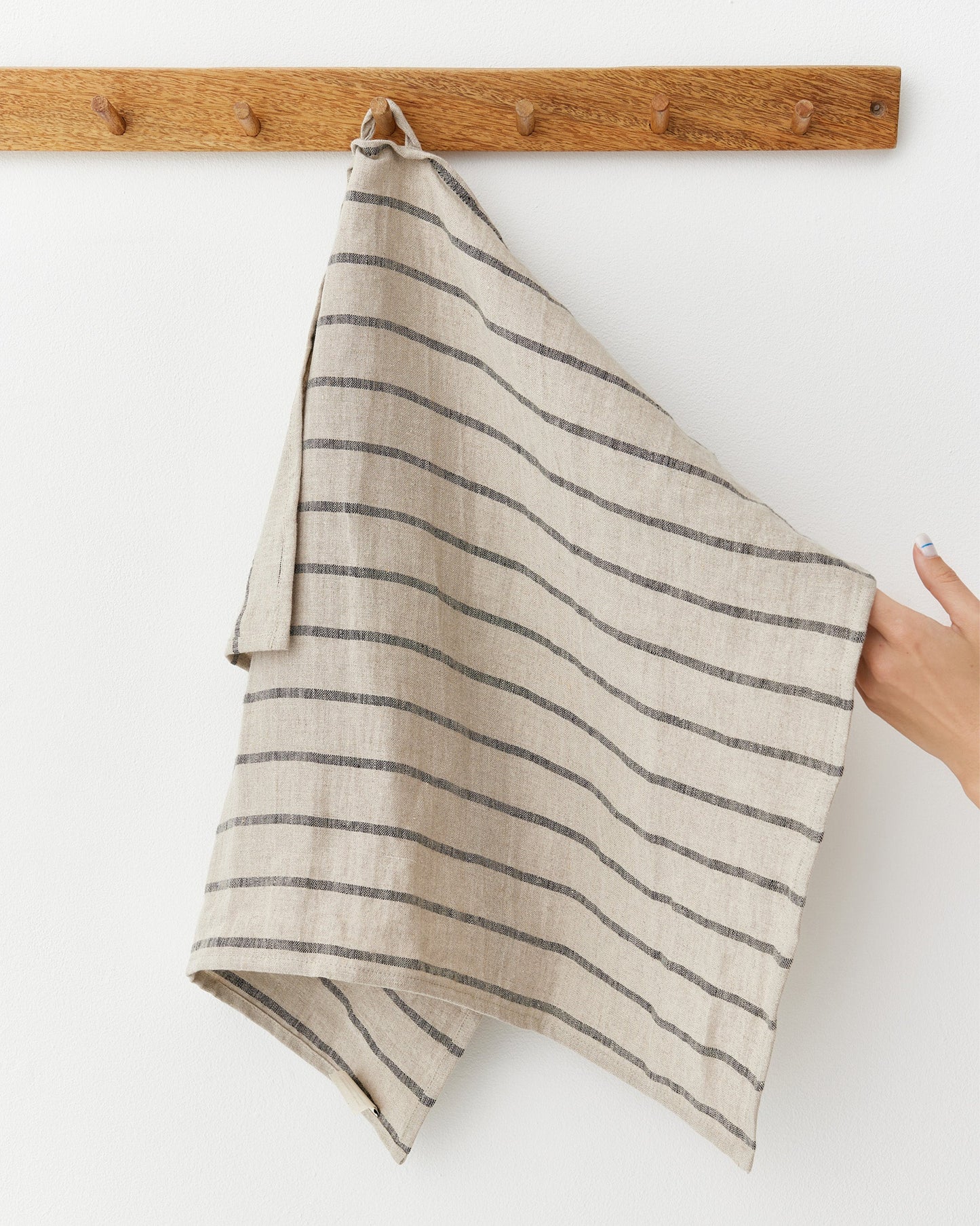 https://cdn.shopify.com/s/files/1/0640/8454/1699/files/linen-tea-towel-in-subtle-lines-4.jpg?v=1758028456