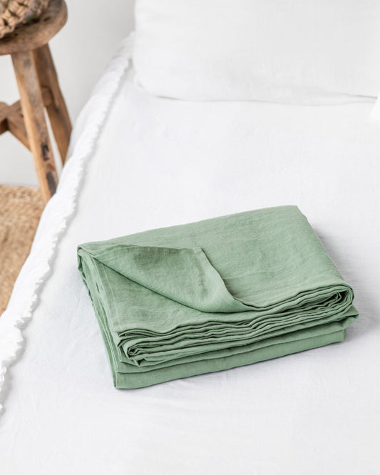 https://cdn.shopify.com/s/files/1/0640/8454/1699/products/matcha-green-linen-flat-sheet-1.jpg?v=1660217296
