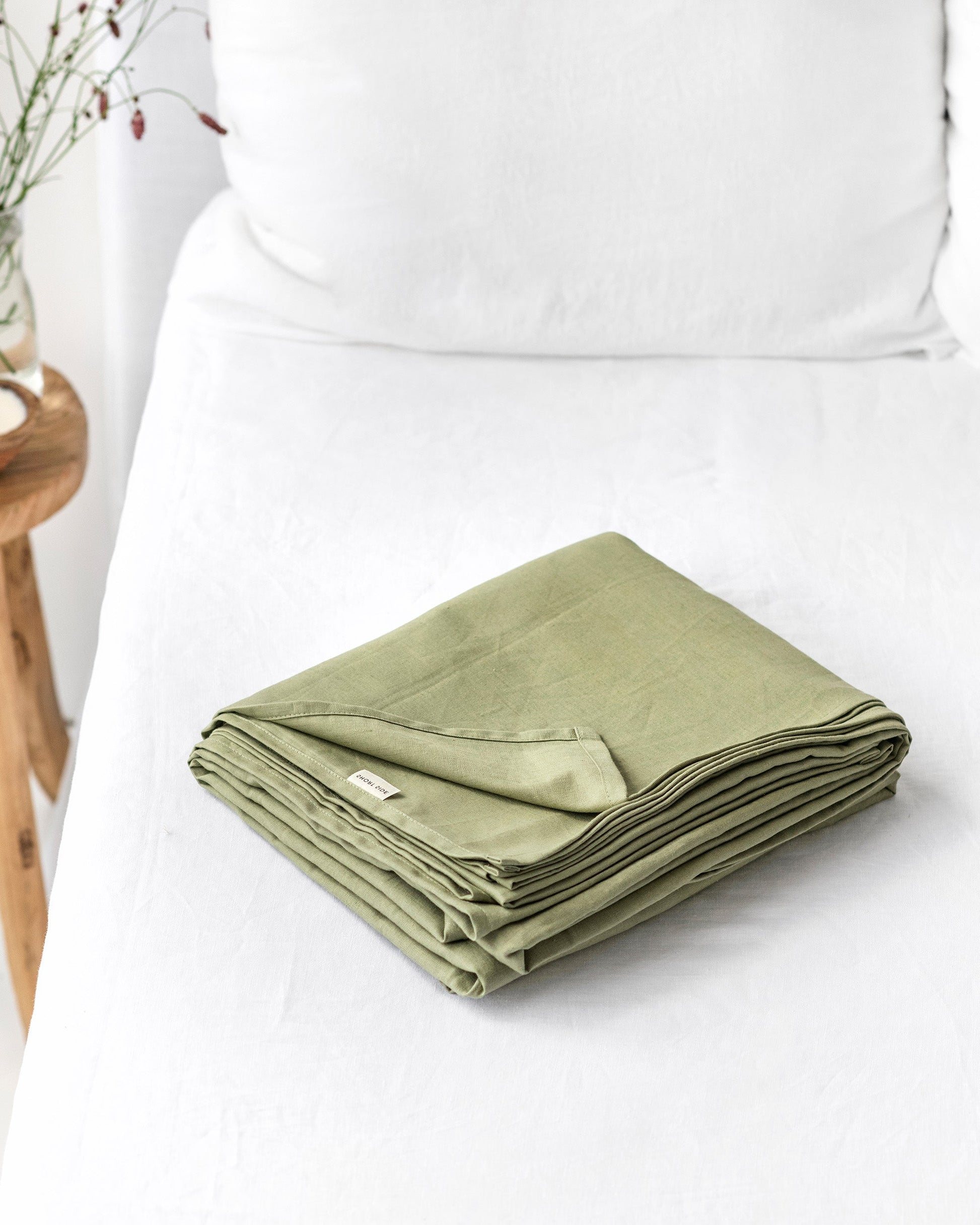 https://cdn.shopify.com/s/files/1/0640/8454/1699/files/sage-linen-flat-sheet.jpg?v=1710938255