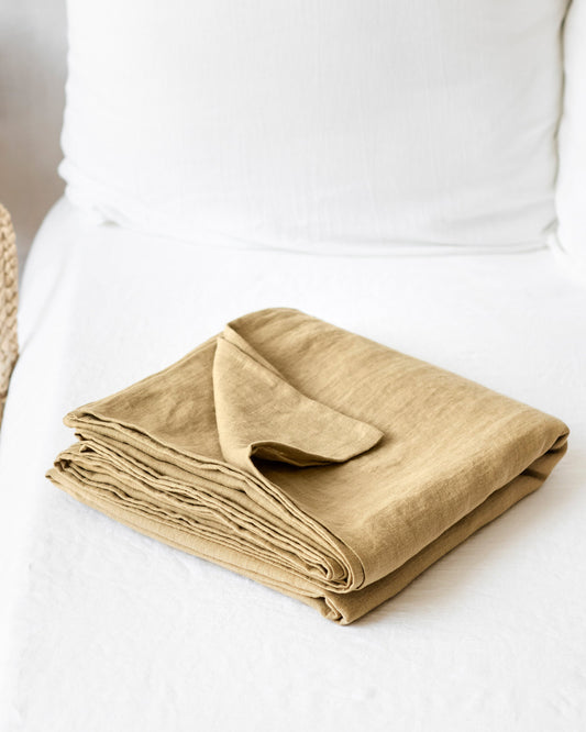 https://cdn.shopify.com/s/files/1/0640/8454/1699/products/sandy-beige-linen-flat-sheet-01.jpg?v=1754487418