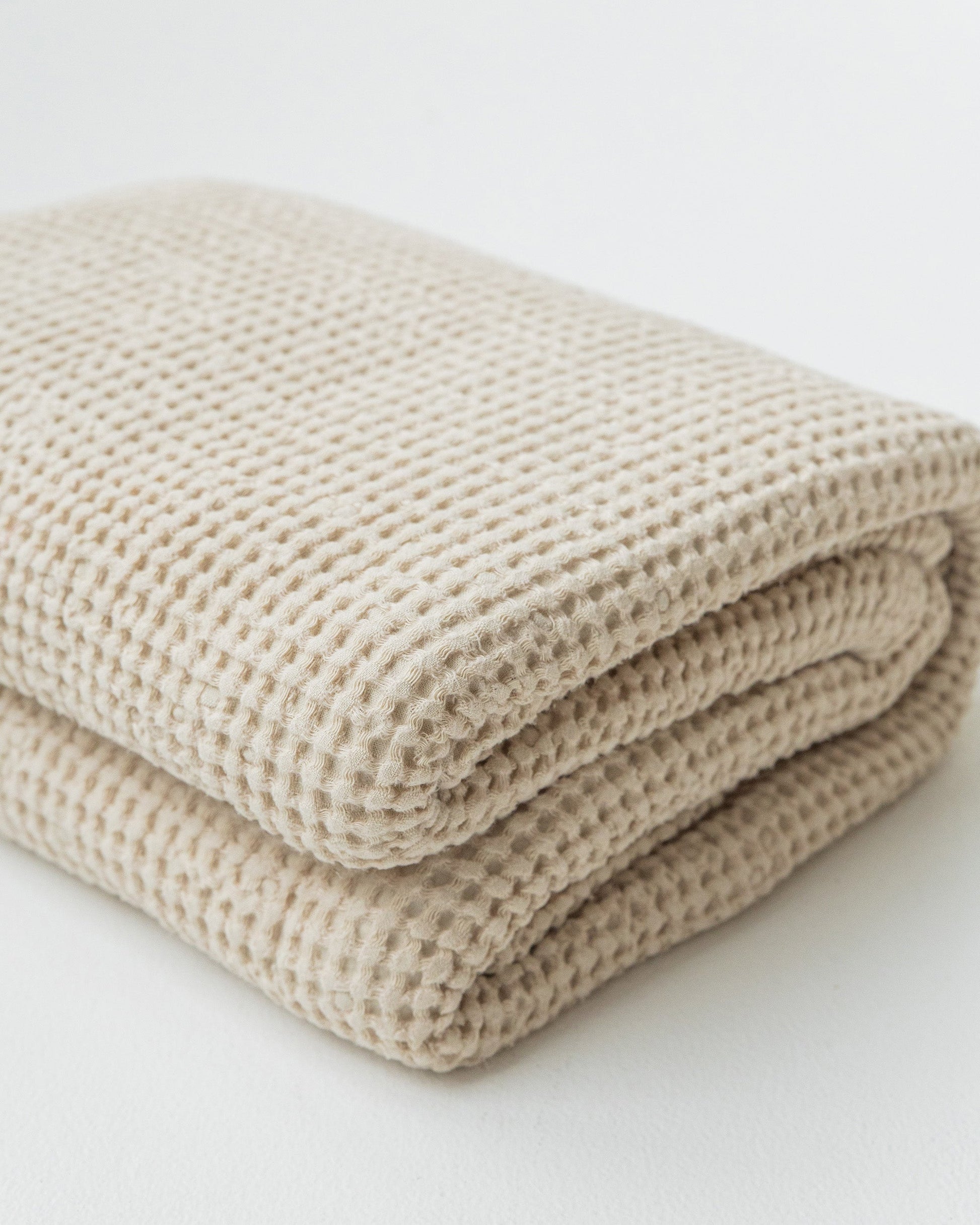 https://cdn.shopify.com/s/files/1/0640/8454/1699/files/waffle-throw-in-vanilla-2_9375b5ee-4435-4867-a968-495dd35aafda.jpg?v=1765361186