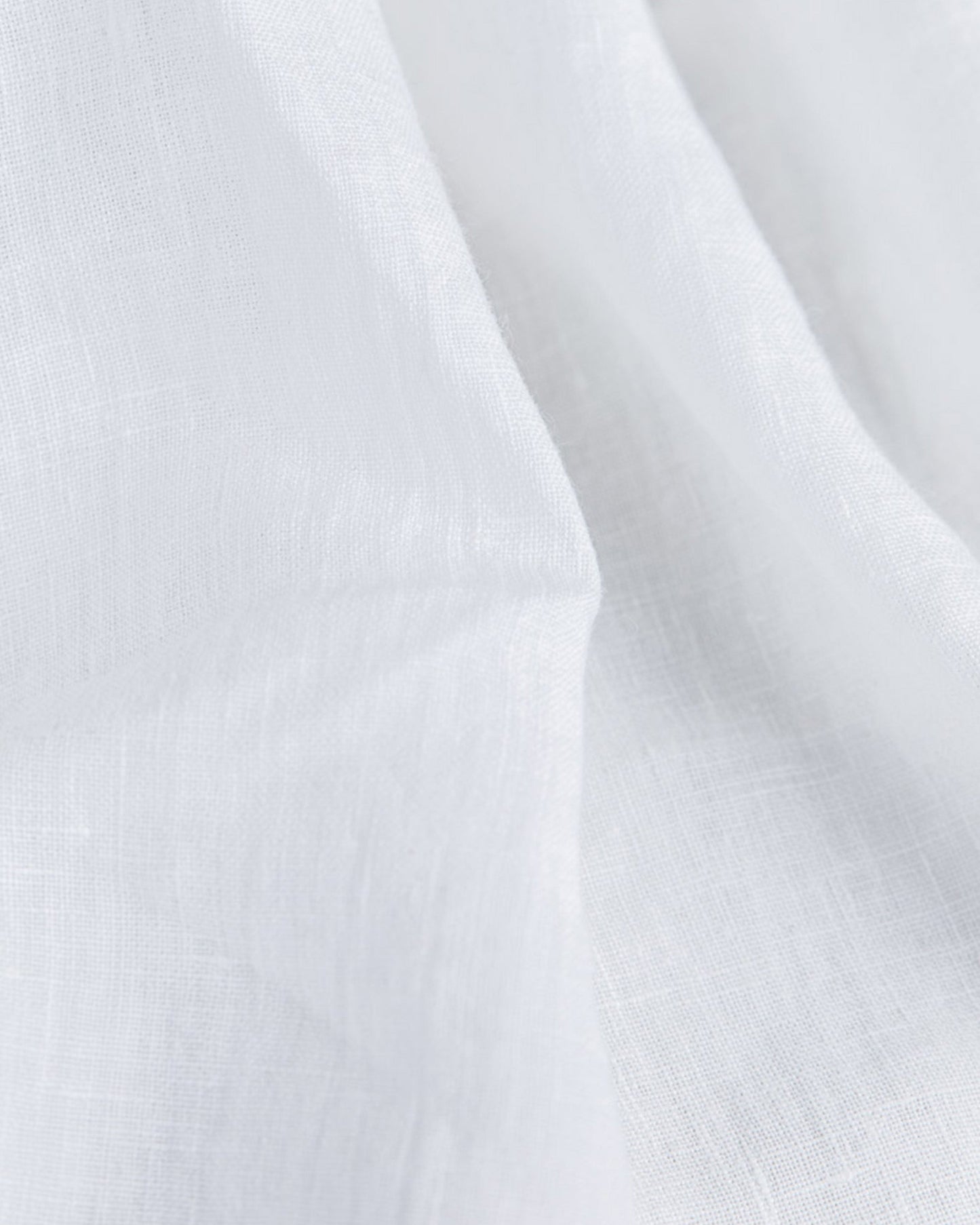 https://cdn.shopify.com/s/files/1/0640/8454/1699/products/white-linen-flat-sheet-2.jpg?v=1675934953